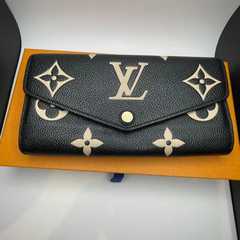 LOUIS VUITTON RFID Bicolor Monogram Empreinte Leather Sarah Wallet - Preowned - Picture 1 of 16